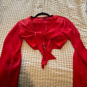 out from under cropped long sleeve red tie shirt